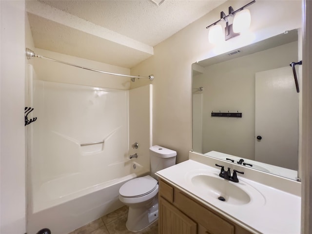 full bathroom with a textured ceiling,  shower combination, toilet, vanity, and tile patterned flooring