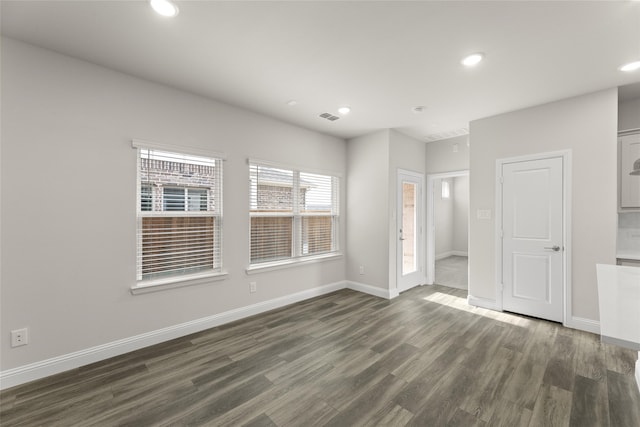 empty room featuring dark hardwood / wood-style floors