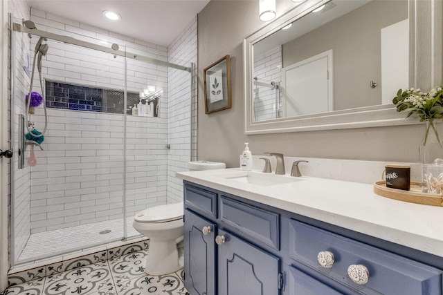 bathroom with walk in shower, vanity, toilet, and tile patterned flooring