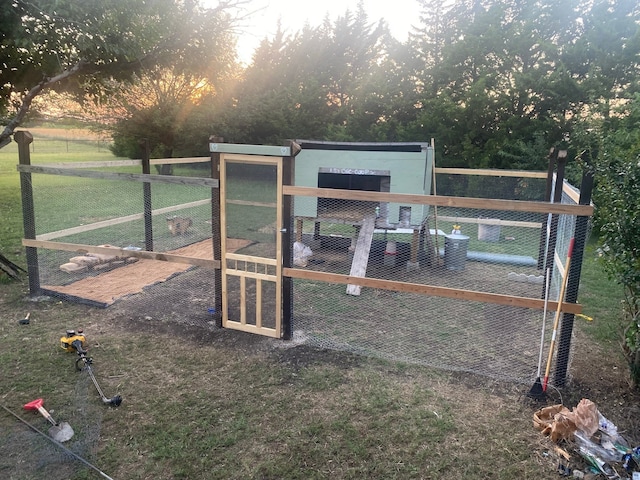 exterior space with an outbuilding and a yard