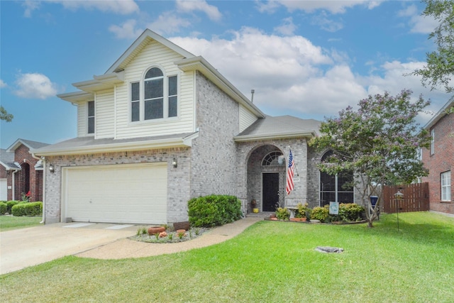4821 Worthing Dr, Garland, TX 75043 - view of front facade with a garage, brick siding, and driveway
