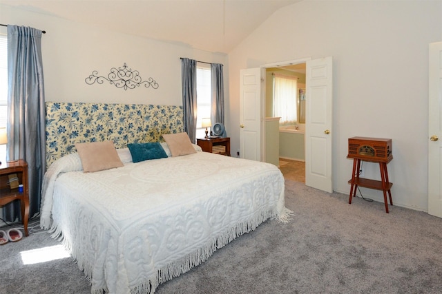 bedroom with carpet and vaulted ceiling