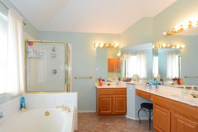 bathroom featuring vanity, lofted ceiling, and shower with separate bathtub