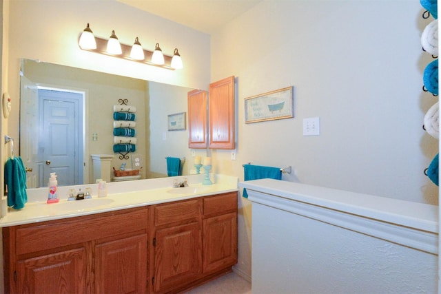 4821 Worthing Dr, Garland, TX 75043 - bathroom featuring toilet and double vanity