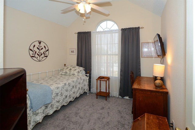 bedroom with carpet, ceiling fan, and vaulted ceiling