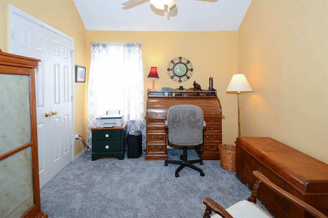 office featuring carpet, ceiling fan, and lofted ceiling