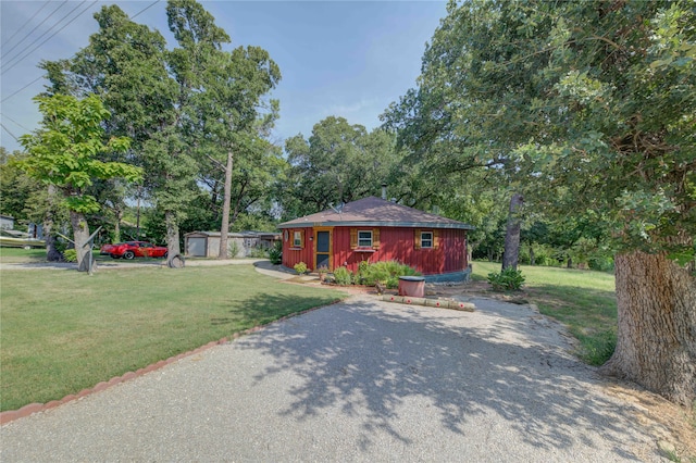 ranch-style house with a front lawn