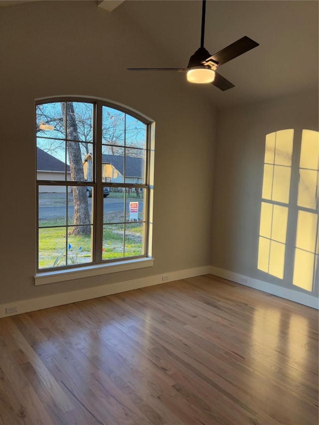 spare room with ceiling fan and light hardwood / wood-style flooring