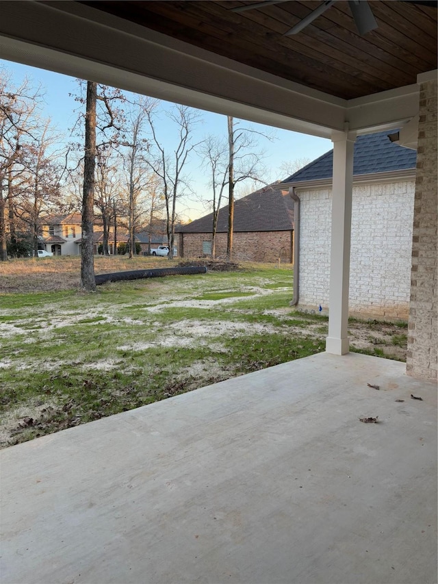 view of patio featuring ceiling fan