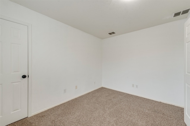 unfurnished room featuring carpet floors