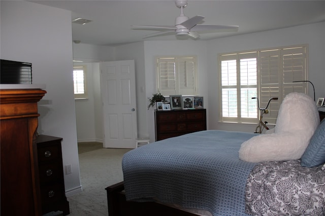 carpeted bedroom featuring ceiling fan