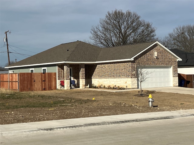 single story home with a garage