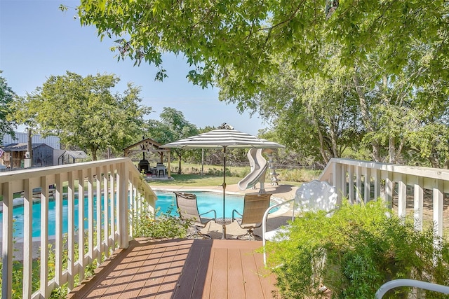 8716 County Road 1224a, Rio Vista, TX 76093 - wooden deck with an outdoor pool