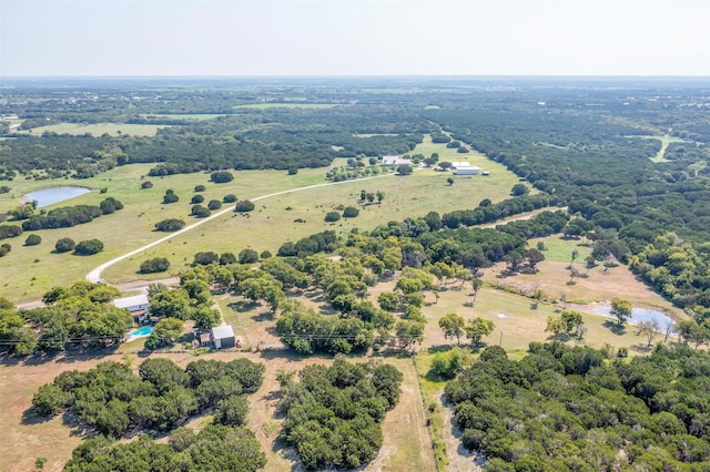 bird's eye view featuring a rural view and a water view