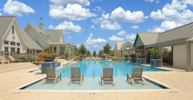 view of pool featuring a patio