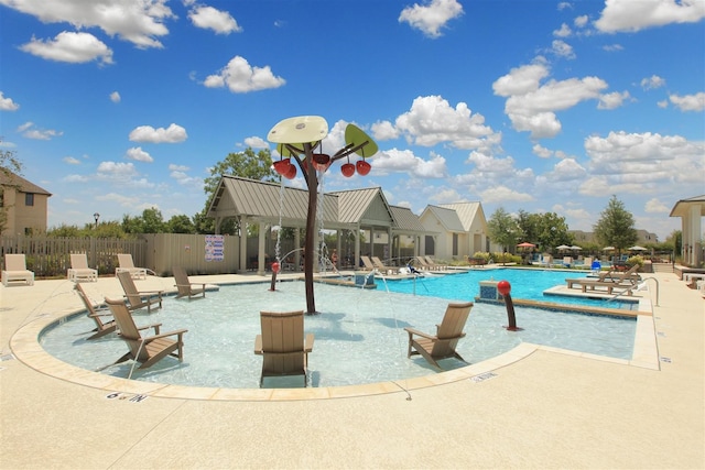 view of swimming pool featuring a patio area