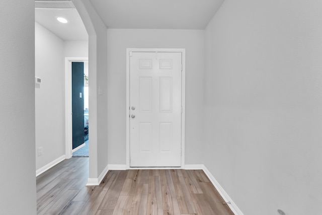 foyer entrance with hardwood / wood-style floors