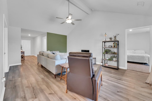 living room with light wood-type flooring, high vaulted ceiling, ceiling fan, and beam ceiling