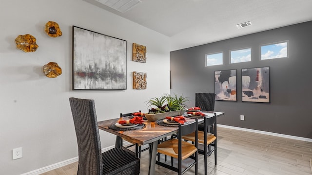 dining area featuring light hardwood / wood-style flooring