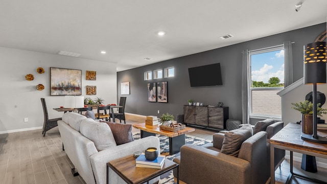 living room featuring light hardwood / wood-style floors