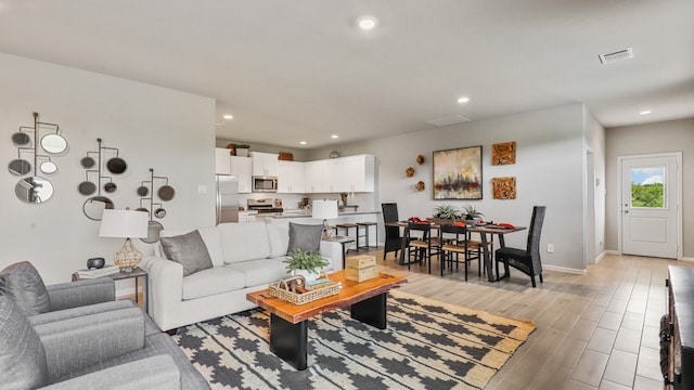 living room featuring light hardwood / wood-style floors