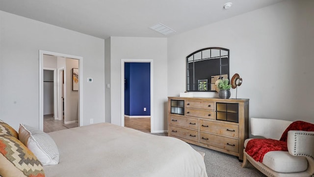 bedroom with light hardwood / wood-style floors