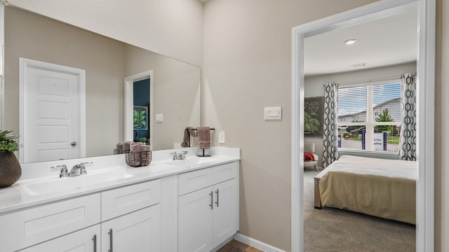 bathroom with double vanity