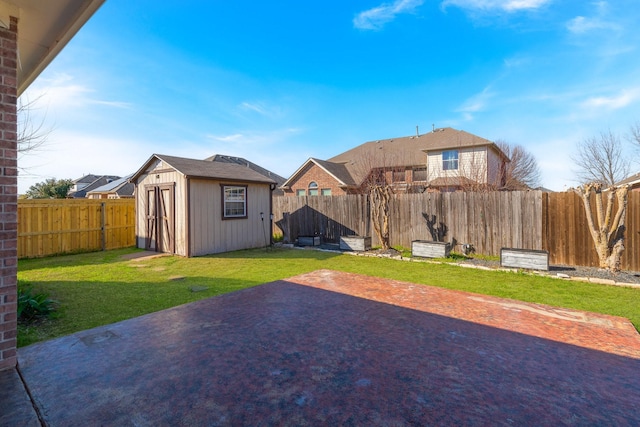 exterior space featuring an outbuilding, a patio, a shed, and a fenced backyard