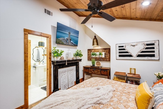 bedroom with ensuite bathroom, ceiling fan, vaulted ceiling, and wooden ceiling