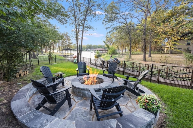 view of patio / terrace featuring a fire pit