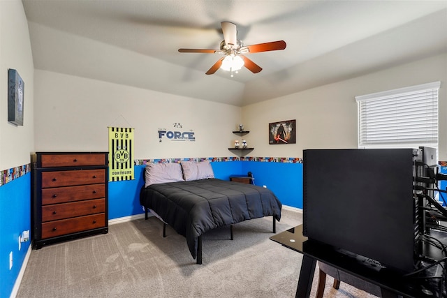 carpeted bedroom featuring ceiling fan and lofted ceiling