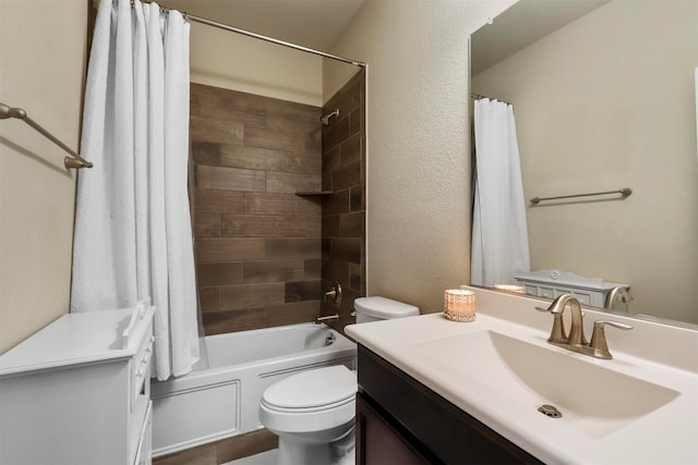 full bathroom featuring vanity, toilet, and shower / bath combination with curtain