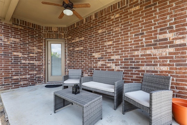 view of patio featuring ceiling fan