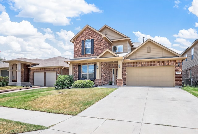 craftsman house featuring a garage, central AC unit, and a front lawn