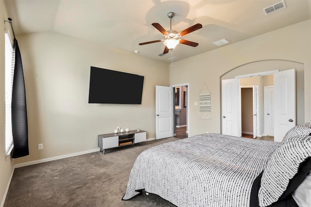 bedroom with carpet, vaulted ceiling, and ceiling fan