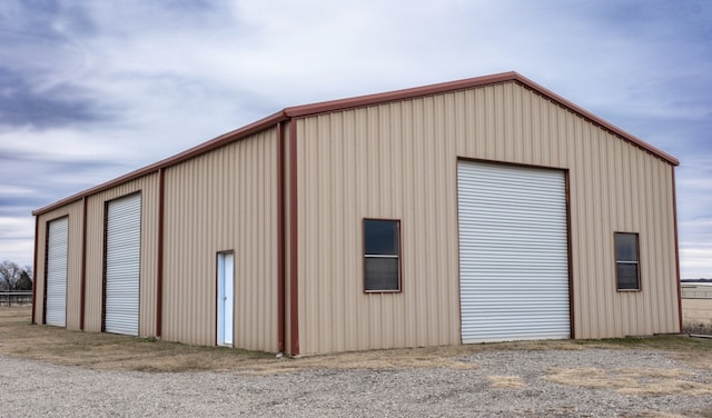 view of outbuilding featuring a garage