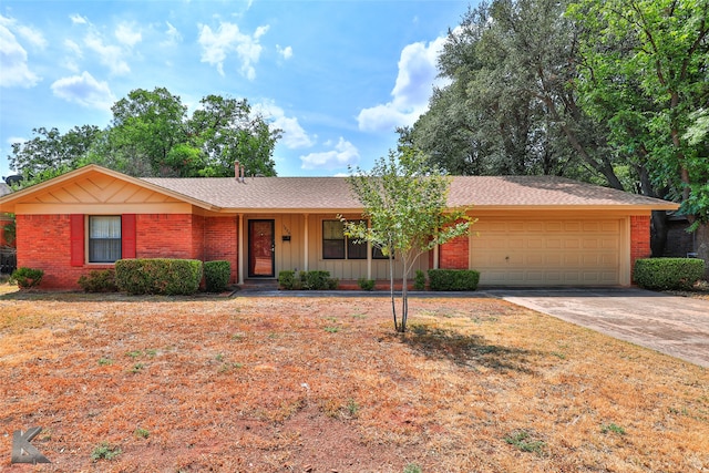 single story home featuring a garage