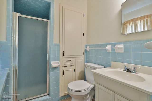 bathroom with toilet, tile walls, backsplash, walk in shower, and vanity