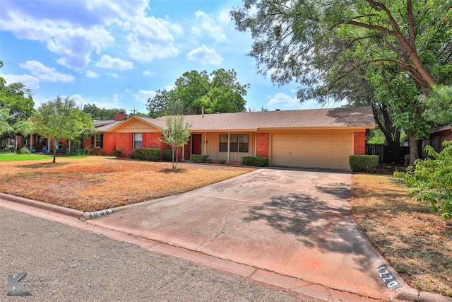 single story home with a garage