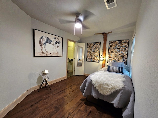 bedroom featuring ceiling fan, wood-type flooring, and a closet