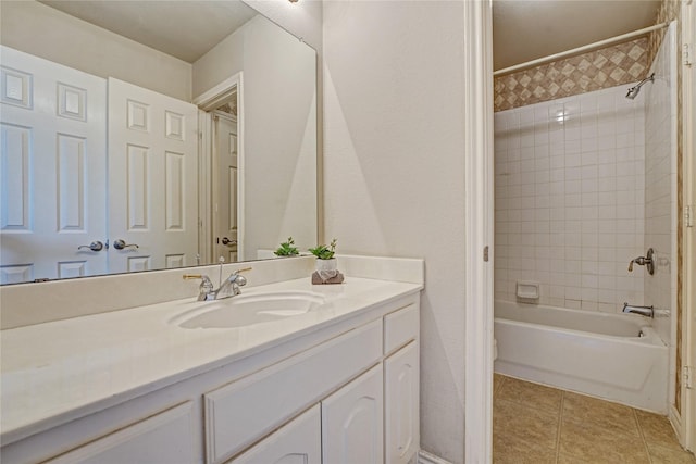 full bathroom featuring tile patterned flooring, shower / washtub combination, and vanity