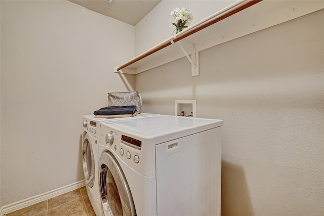 laundry room with independent washer and dryer