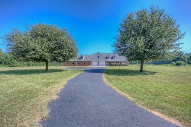 view of front of house with a front lawn