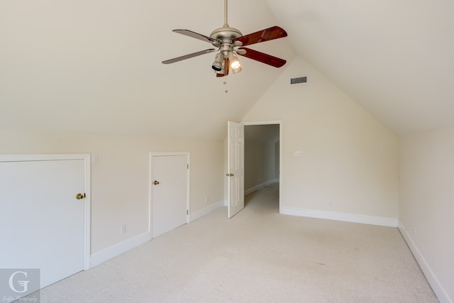 bonus room with lofted ceiling, carpet flooring, and ceiling fan