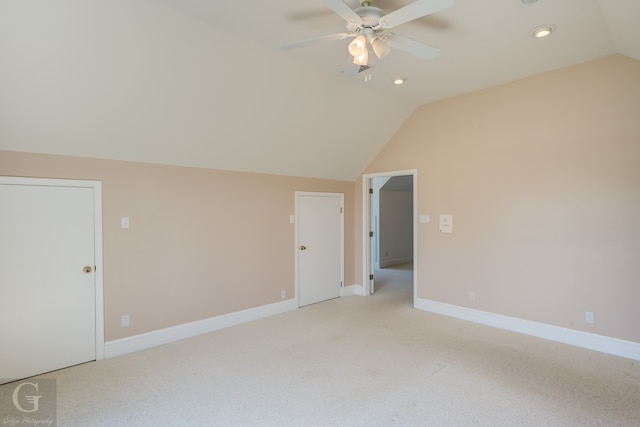 bonus room featuring lofted ceiling, carpet flooring, and ceiling fan