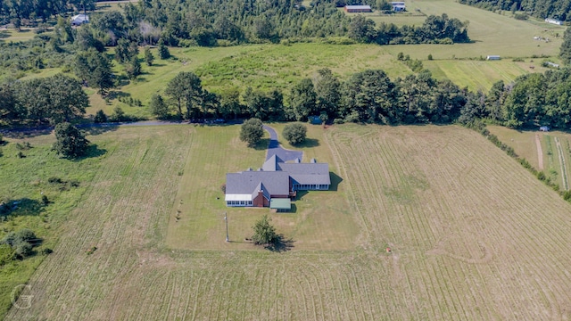 birds eye view of property featuring a rural view