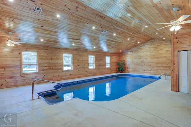 view of swimming pool with a jacuzzi and ceiling fan