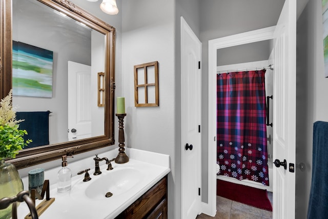 bathroom with vanity and tile patterned flooring