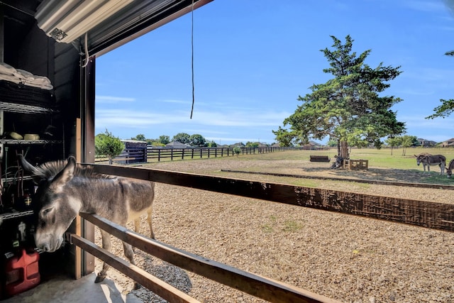 view of yard featuring a rural view