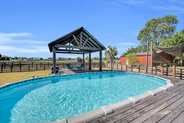 view of pool featuring a wooden deck